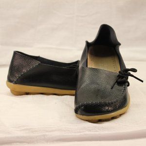 Black leather slip on